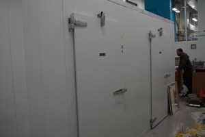 two doors of a large walk-in cooler