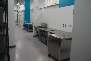 commercial kitchen prep space with stainless steel tables