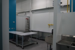 commercial kitchen prep space with stainless steel tables.