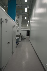 Hallway with the walk-in cooler doors on the left