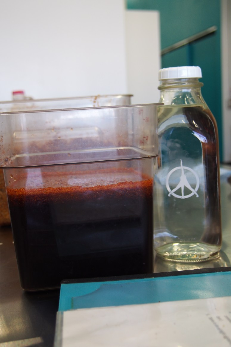 bottle of water with the Pure peace yoga logo