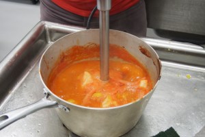 Blending the peaches.