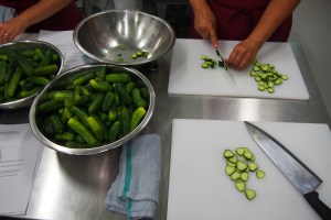 Chop chop everyone. Prepping the cukes into pickles.
