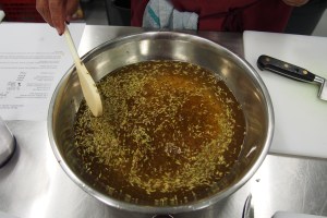 The brine mix, this boils and cooks the cukes that magically turn them into pickles.