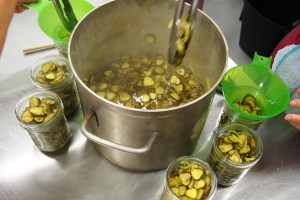 Scooping out the pickles.